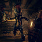 Robotic figure in a dark, industrial setting
