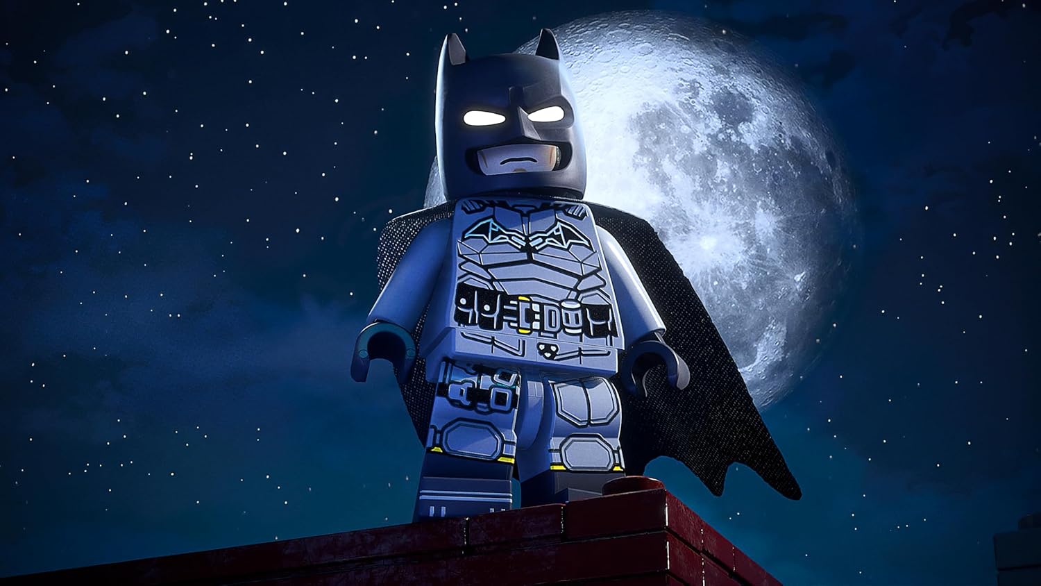 LEGO Batman figure on a rooftop with a full moon in the background
